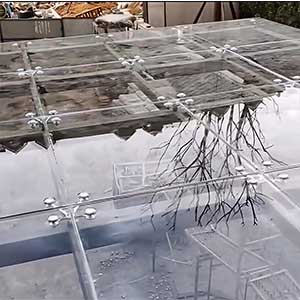 The Heart of Frameless Glass: Dual Applications of Stainless Steel Spider Fittings in Singapore Facades & Canopies