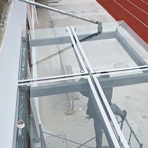 Mastering Tropical Architecture: A Guide to Glass Canopies Using Spider Fittings and Tension Rods in Malabo