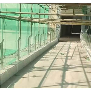 Defeating Caribbean Hurricanes & Salt Spray: Marigot Commercial Corridor Glass Railing Solutions